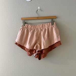 FREE PEOPLE - Women’s Layered Running Shorts in Light Pink and Rust - size small